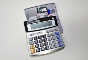 Desk calculator with microphone and GSM transmitter.